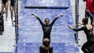 niya salutes on bars