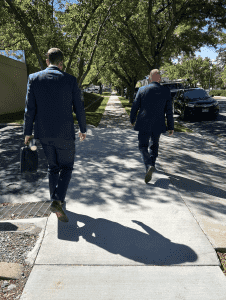 County Attorney Chad Dotson and Deputy Attorney Shane Klenk walking over to the courthouse for closing arguments